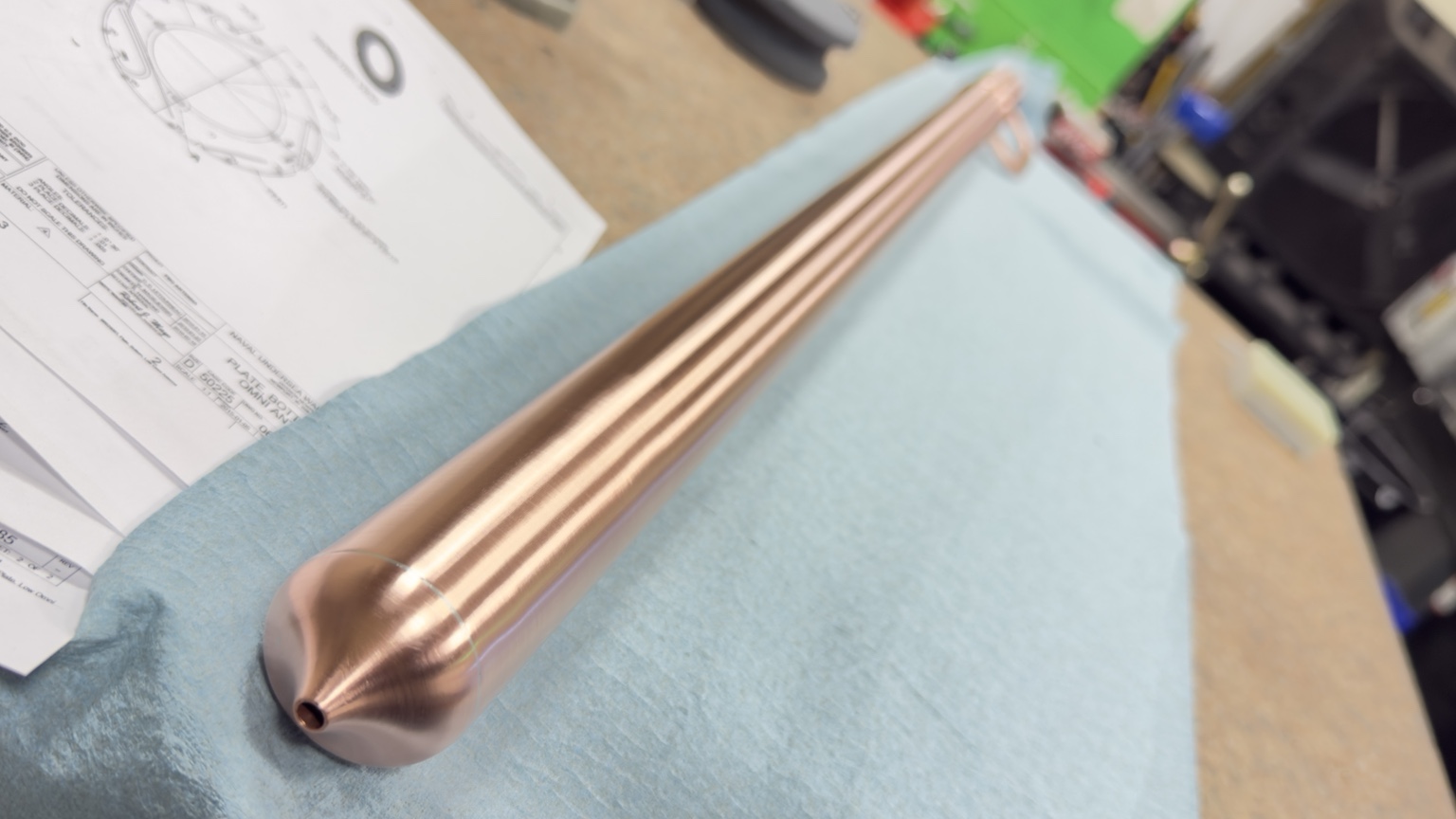 Long precision machined copper component